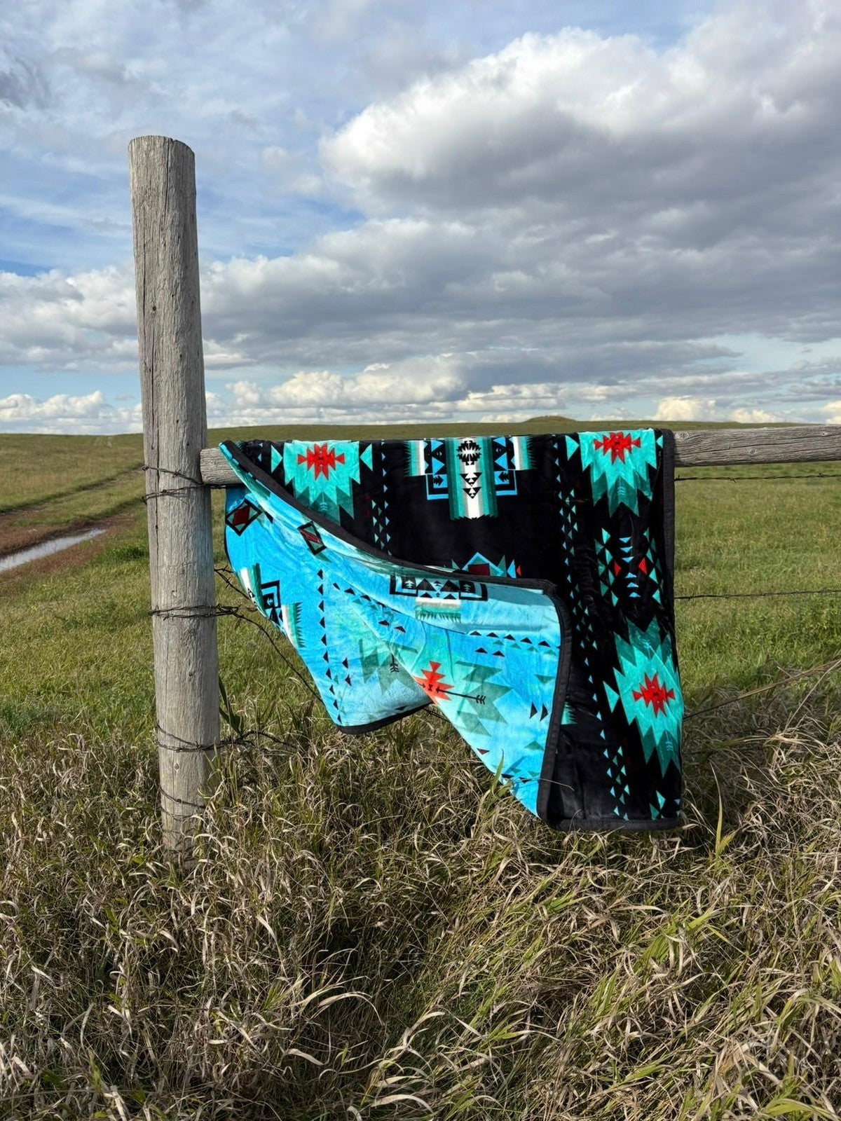 GS Blankets Throw blanket on a fence
