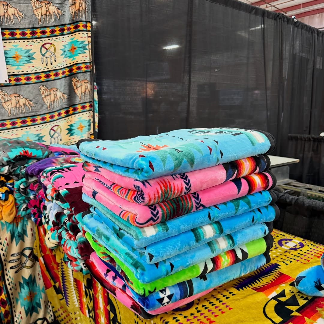 Stack of colorful GS Blankets