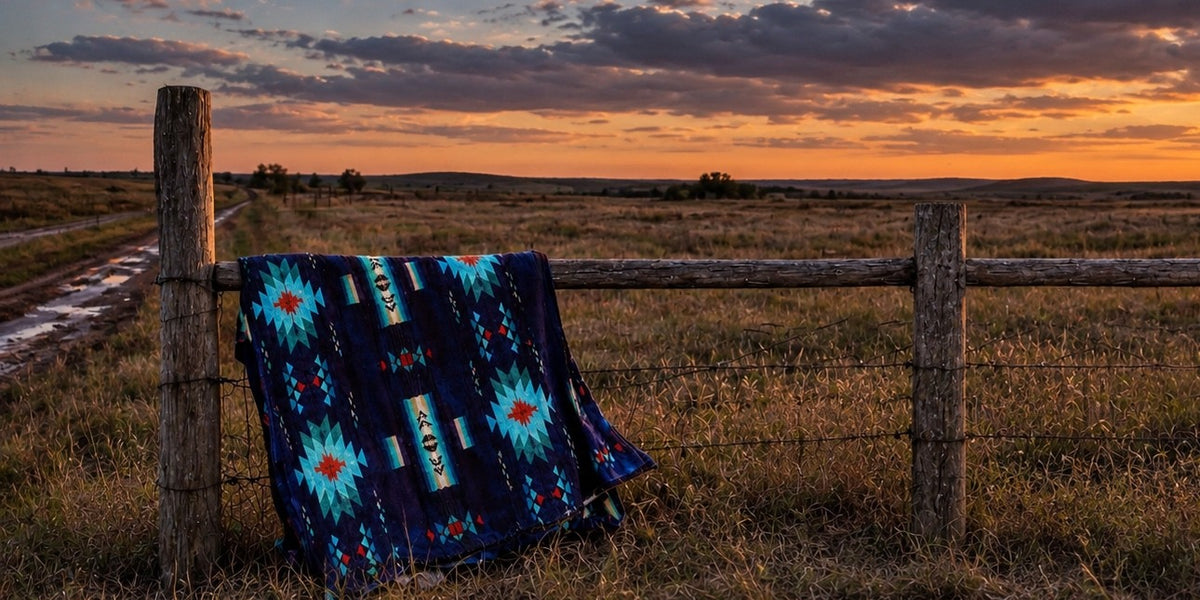 GS Blankets blanket on a prairie fence at sunset